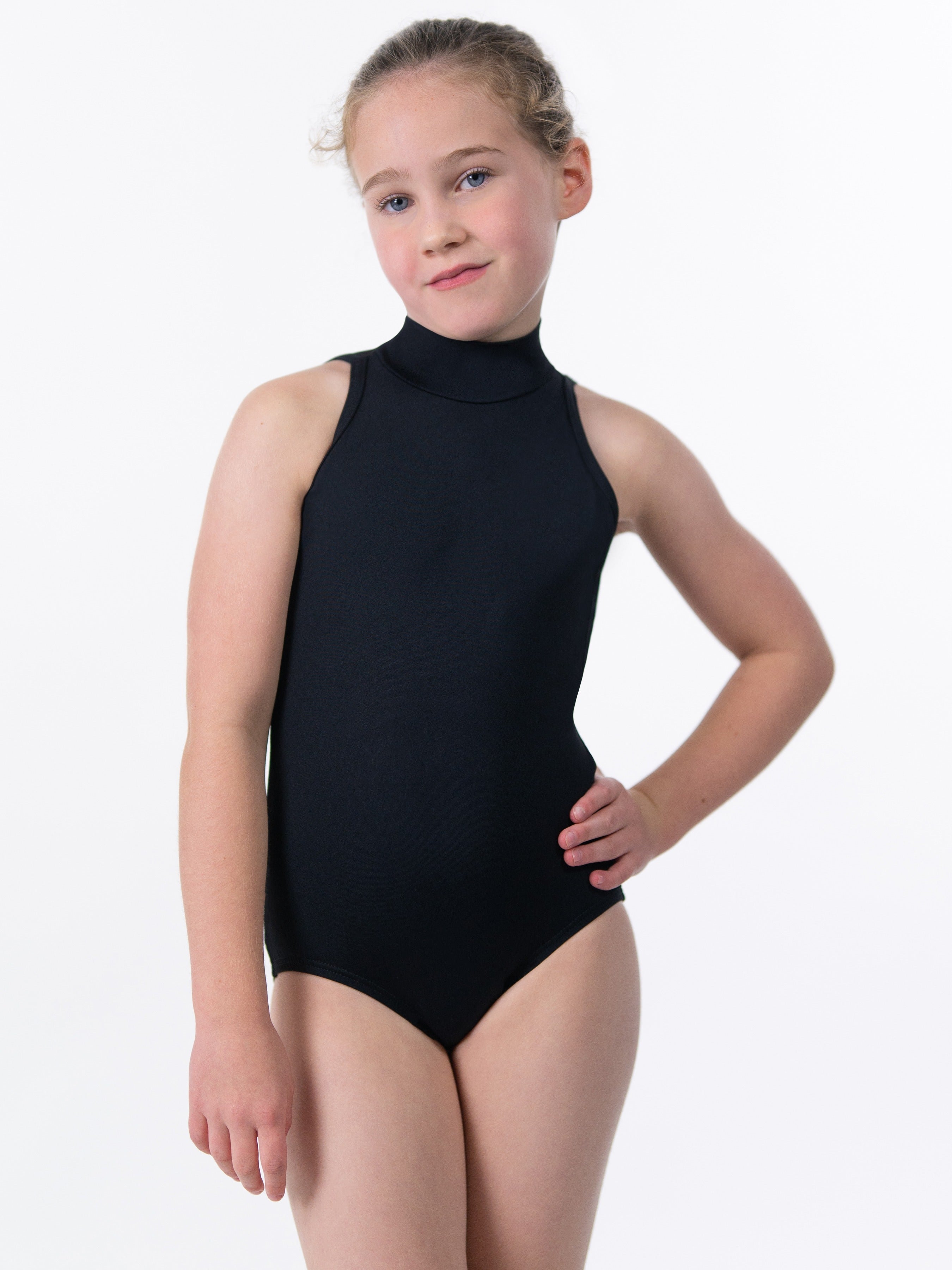 Model wearing black, Mock turtleneck leotard with mesh straps and open back.